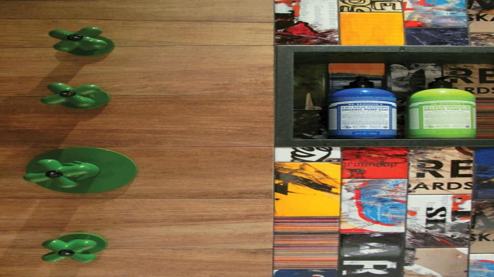 Shower fitting detail in skateboard themed bathroom