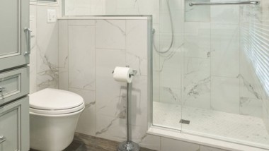 Updated bathroom with Geberit toilet system by Ronda Ballard