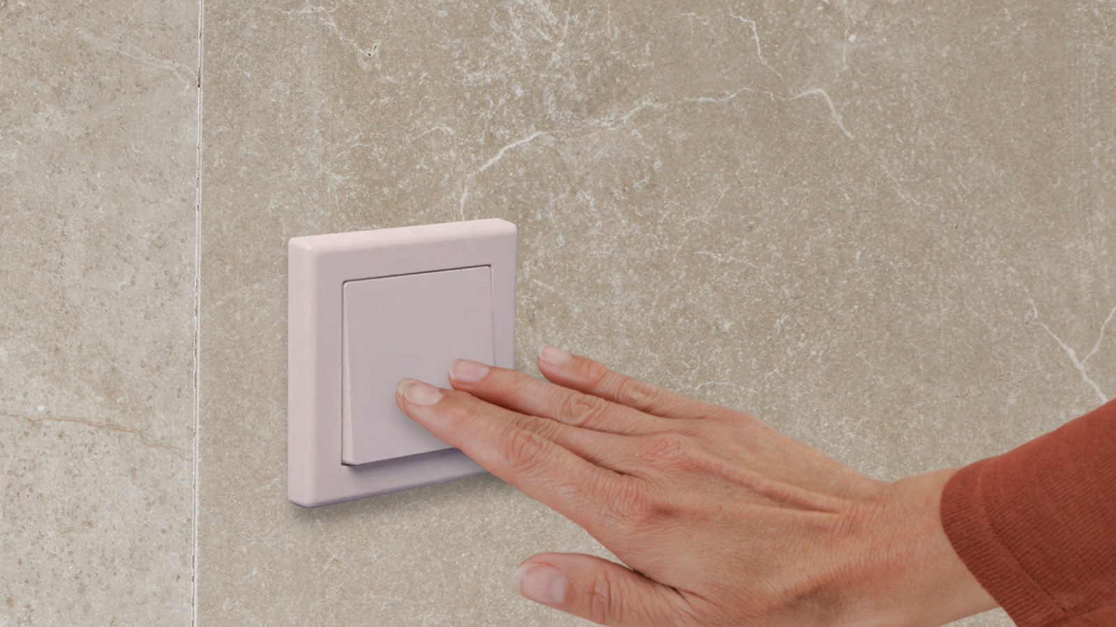 Closeup of electric push-button connected to a Geberit flush lifter Closeup of electric push-button connected to a Geberit flush lifter