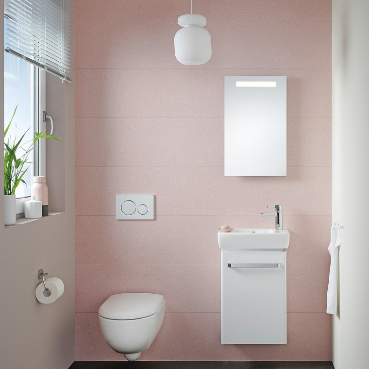 Small guest bathroom with compact handrinse basin and wall-hung toilet Small guest bathroom with compact handrinse basin and wall-hung toilet