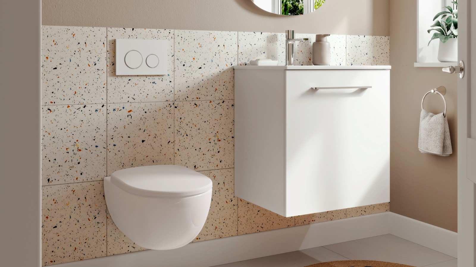 Small Geberit bathroom with wall-hung toilet and washbasin Small Geberit bathroom with wall-hung toilet and washbasin
