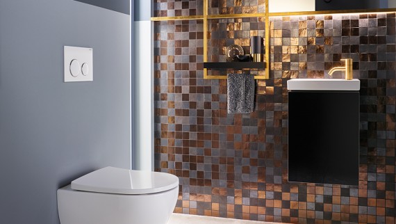 Bathroom in earthy tones with wall-hung toilet, Geberit in-wall system, and bidet seat