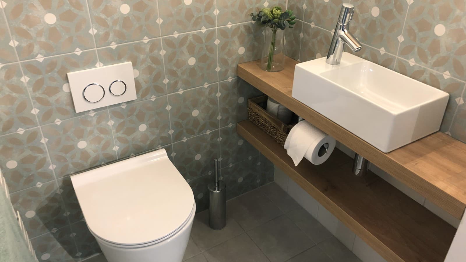 Wall-hung toilet in a modern bathroom. Wall-hung toilet in a modern bathroom.