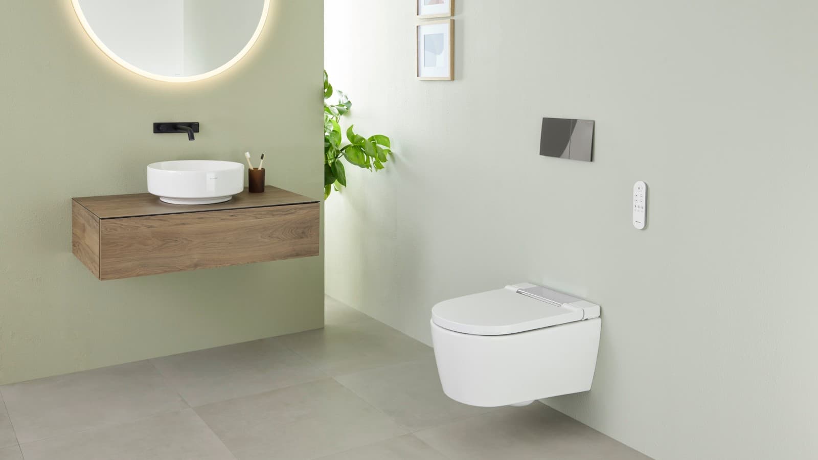 Pale green bathroom with wall-hung bidet toilet Pale green bathroom with wall-hung bidet toilet