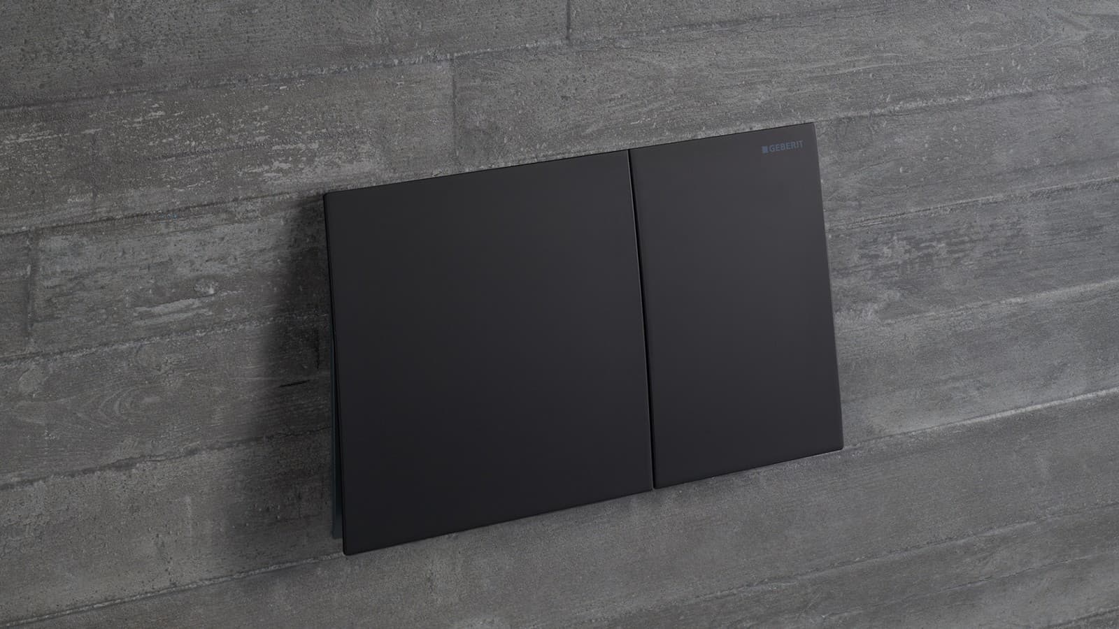 Closeup of Sigma70 flush plate in black finish Closeup of Sigma70 flush plate in black finish