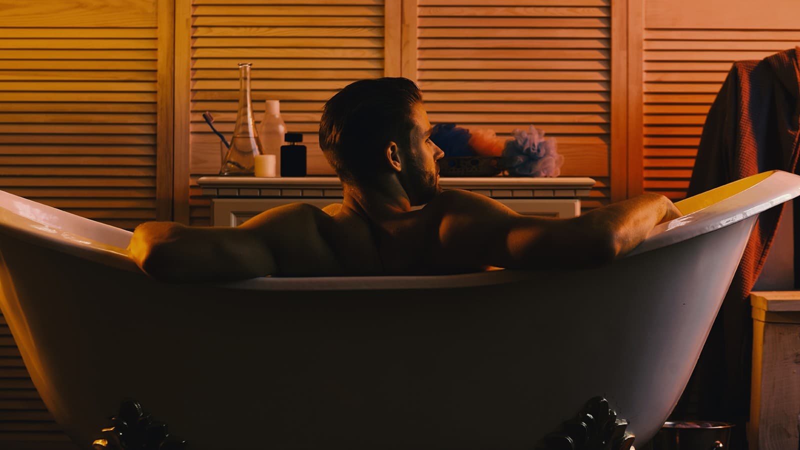 Man relaxing in bathtub Man relaxing in bathtub