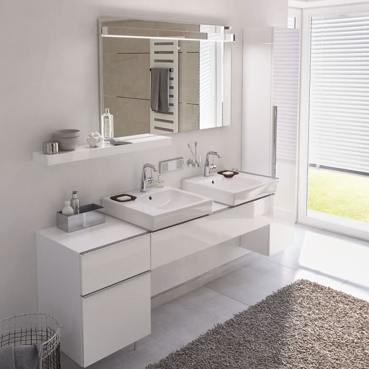 A bath rug can add a splash of color to a light bathroom A bath rug can add a splash of color to a light bathroom