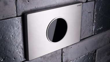 Sigma10 flush plate on stone wall Sigma10 flush plate on stone wall